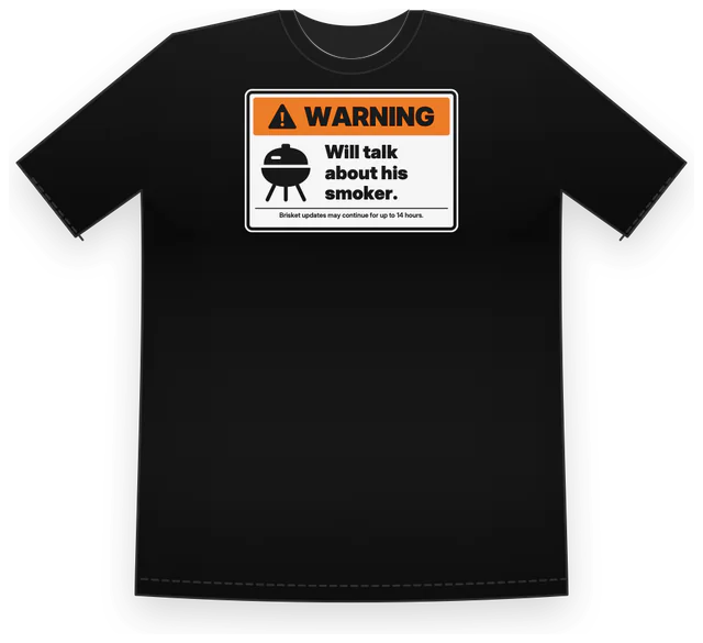 A black tee with an orange WARNING sign and a grill icon: Will talk about his smoker, made with Fair Warning